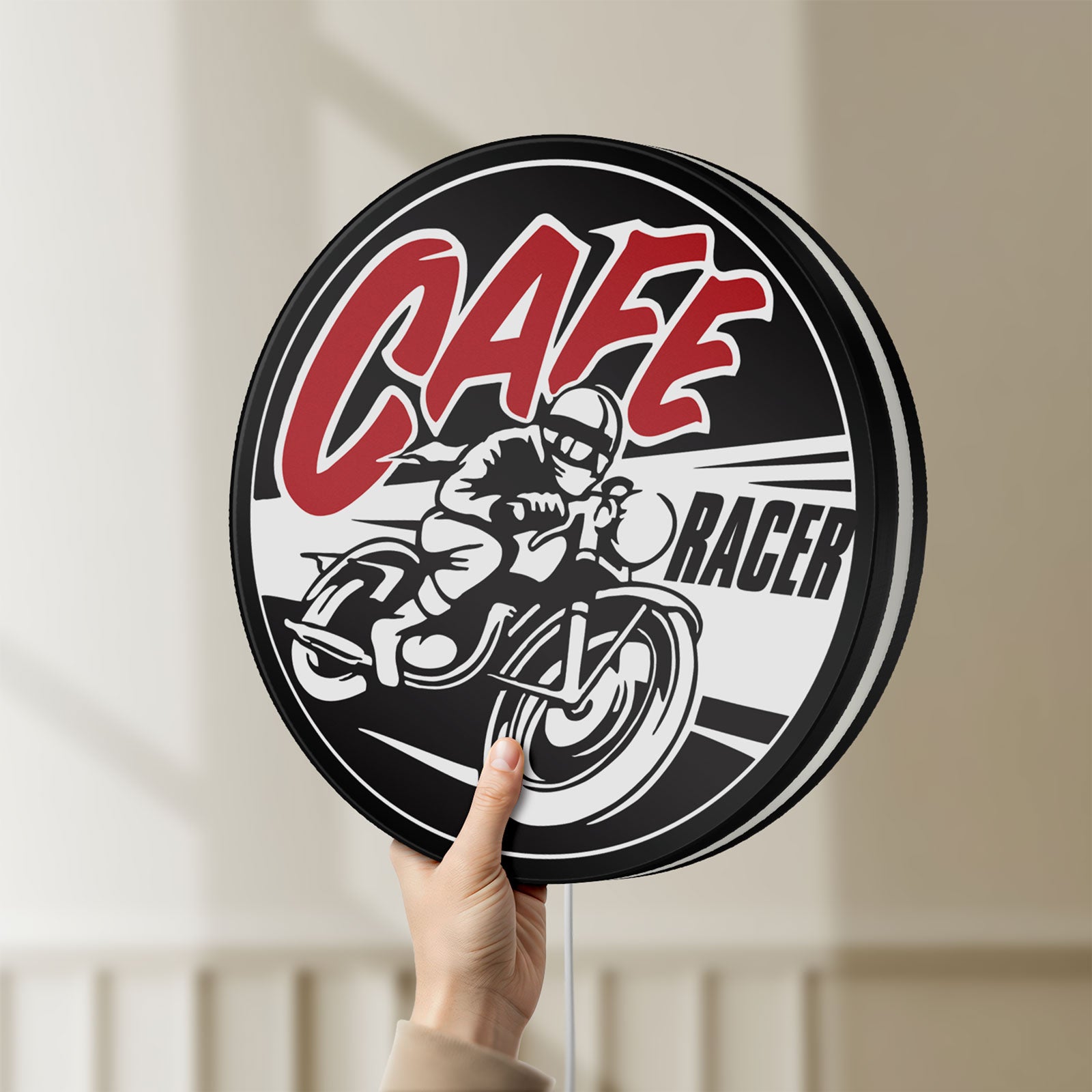 Unlit Cafe Racer LED lightbox held by hand to show size and details