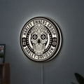 Harley Owners Group LED lightbox hanging on a wall with white glow