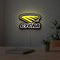 Cycra Racing LED lightbox hanging on a room wall with soft white light