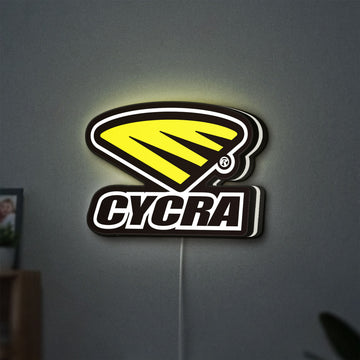 Cycra Racing LED lightbox hanging on a wall with white glow