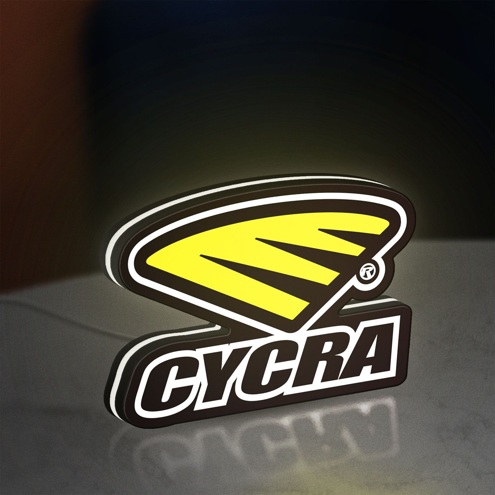 Cycra Racing LED lightbox standing on a desk from an angled side view with white glow