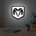 DODGE RAM LED lightbox hanging on a room wall with soft white light