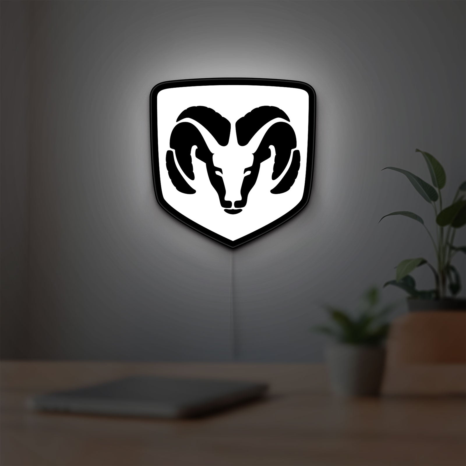 DODGE RAM LED lightbox hanging on a room wall with soft white light