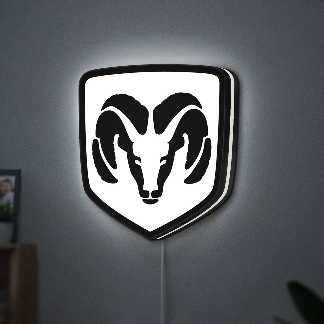 DODGE RAM LED lightbox hanging on a wall with white glow