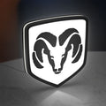 DODGE RAM LED lightbox standing on a desk from an angled side view with white glow