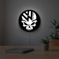 VW Volkswagen Skull LED lightbox hanging on a room wall with soft white light