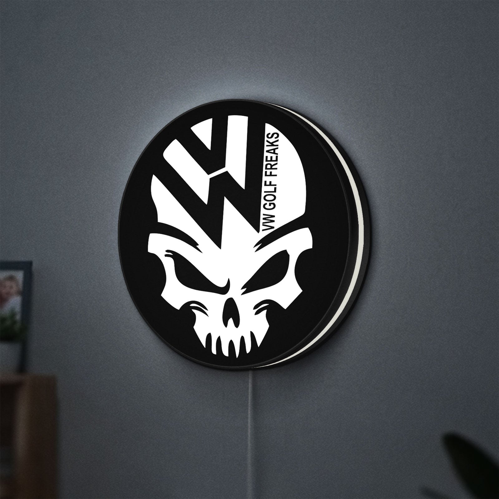 VW Volkswagen Skull LED lightbox hanging on a wall with white glow