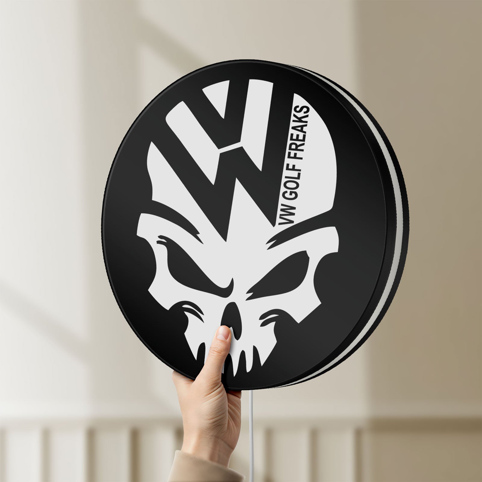 Unlit VW Volkswagen Skull LED lightbox held by hand to show size and details