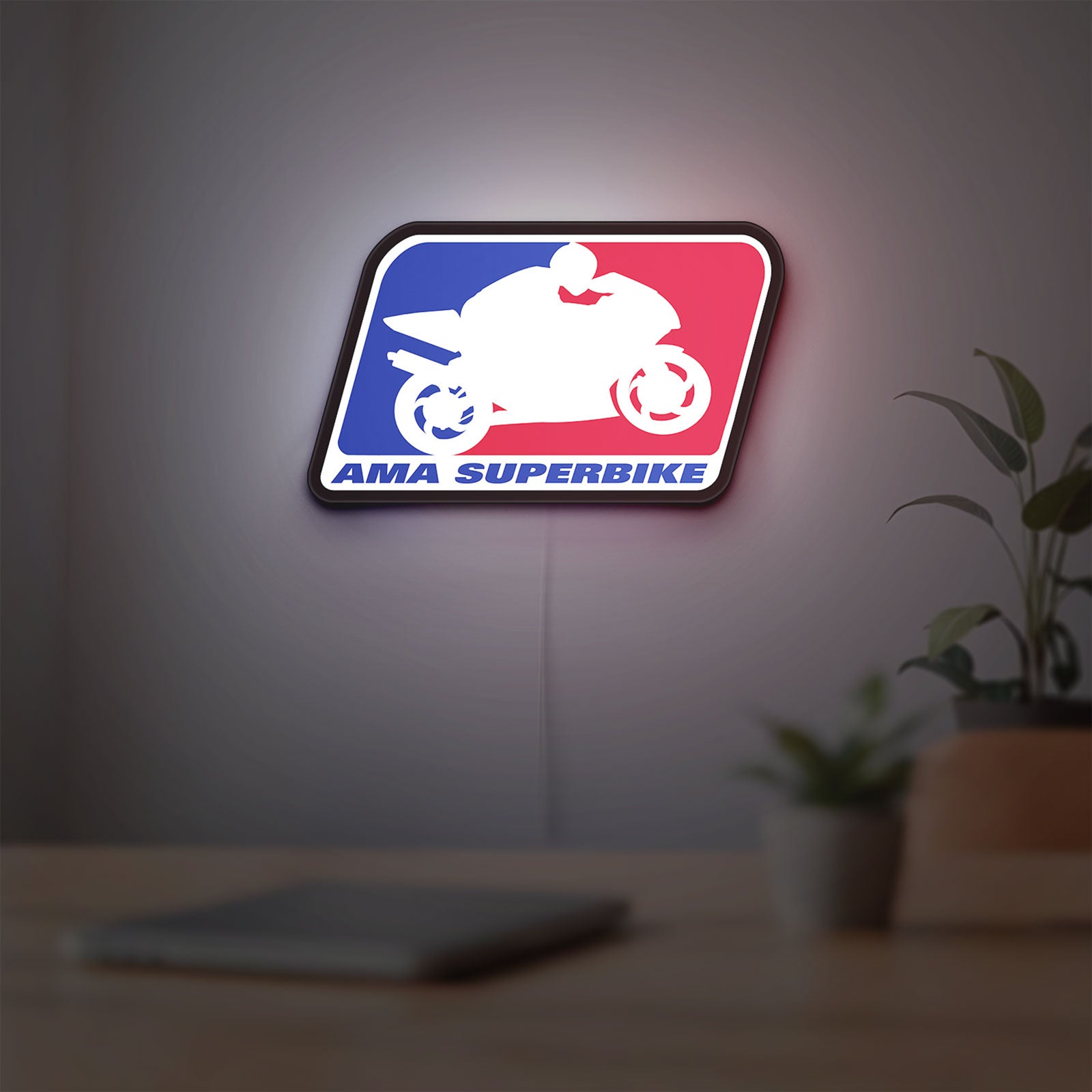 AMA Superbike LED lightbox hanging on a room wall with soft white light