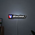 iRacing LED lightbox hanging on a wall with white glow