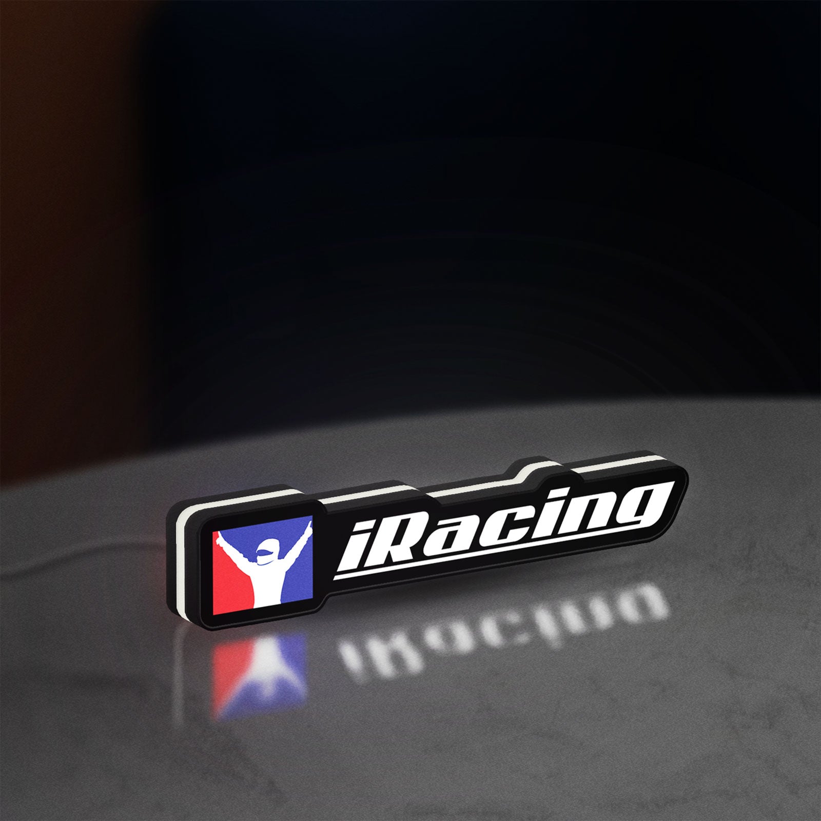 iRacing LED lightbox standing on a desk from an angled side view with white glow