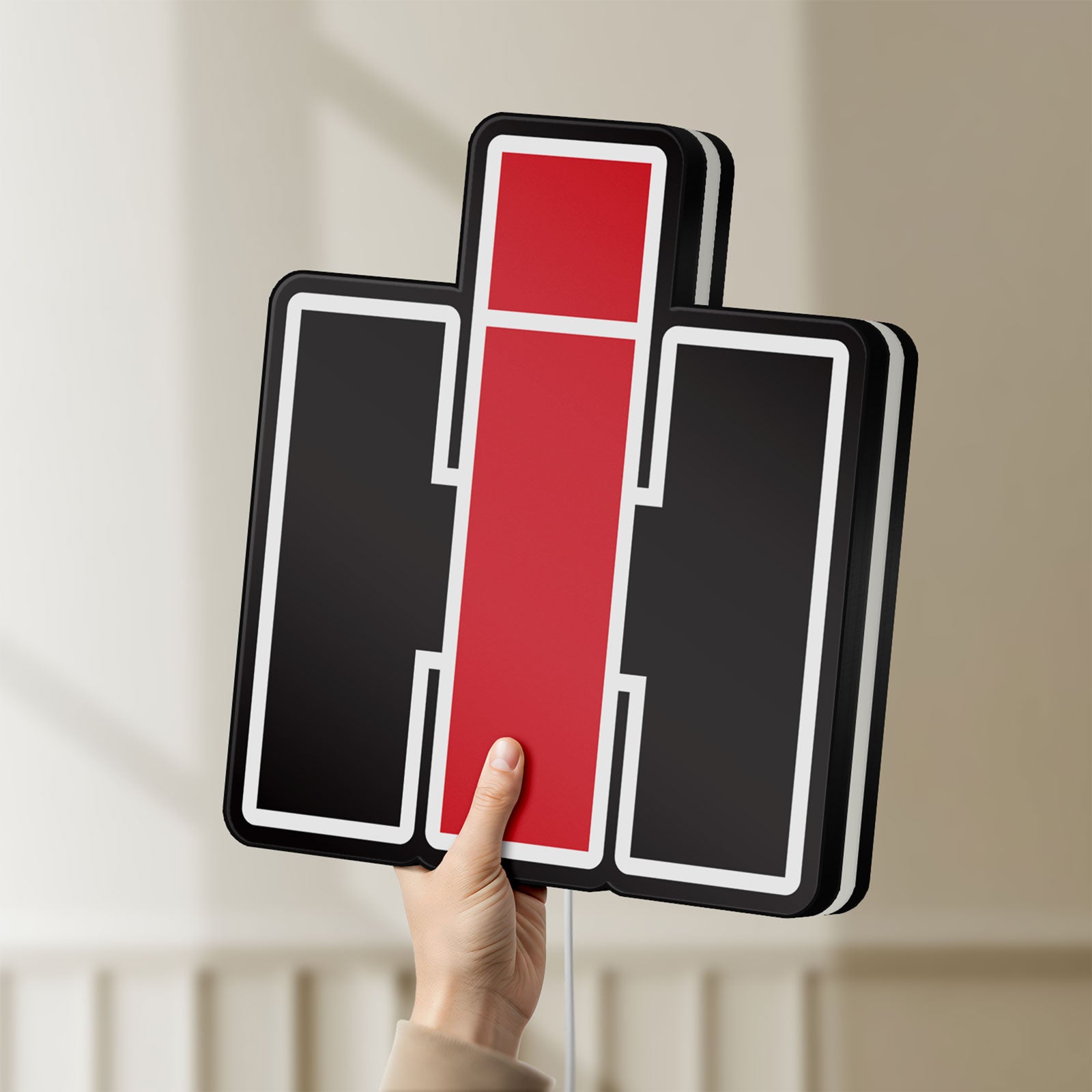 Unlit International Harvester LED lightbox held by hand to show size and details
