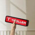 Unlit Troller LED lightbox held by hand to show size and details