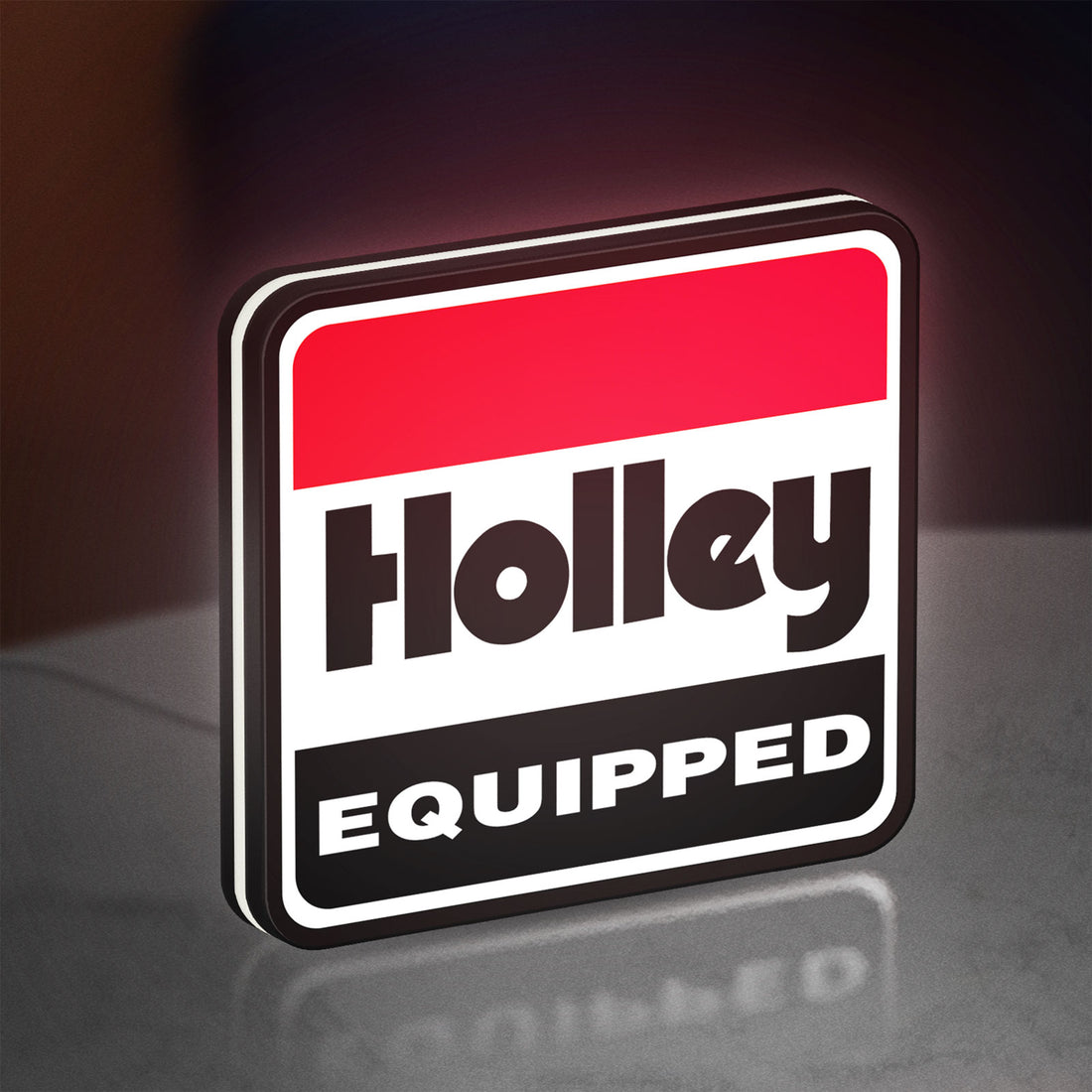 Holley Equipped LED lightbox hanging on a wall with white glow