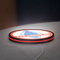 Cobra LED lightbox lying flat on a desk with red glow