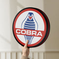 Unlit Cobra LED lightbox held by hand to show size and details