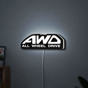 AWD LED lightbox hanging on a wall with white glow