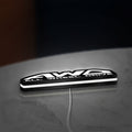 AWD LED lightbox lying flat on a desk with white glow