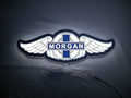 Morgan Motors LED Sign (30cm) - Illuminated flat lay front view, unique wall art for desk and room decor