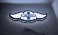 30cm Morgan Motors 3D Printed Sign - Illuminated flat lay angled view, unique wall art for desk and room decor