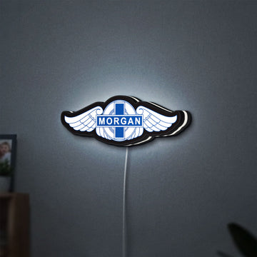 Morgan Motors LED lightbox hanging on a wall with white glow