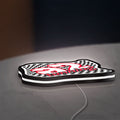 A2 Tuning LED lightbox lying flat on a desk with white glow