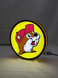 20cm Buc Ee S Beaver Mascot 3D Printed Sign - Illuminated angled view standing, unique wall art for desk and room decor