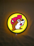 Buc Ee S Beaver Mascot LED Sign (20cm) - Illuminated flat lay front view, unique wall art for desk and room decor