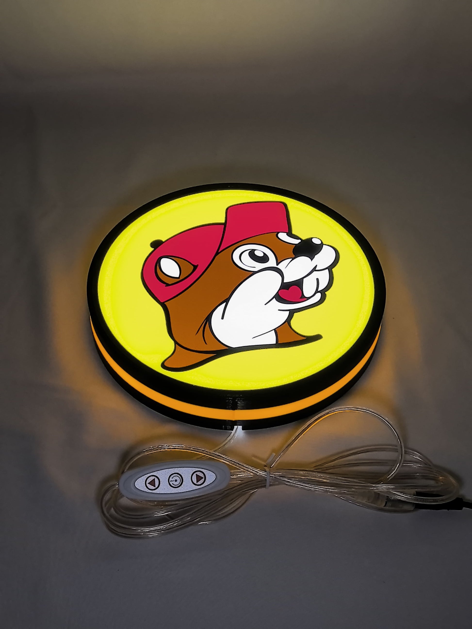20cm Buc Ee S Beaver Mascot 3D Printed Sign - Illuminated flat lay angled view, unique wall art for desk and room decor