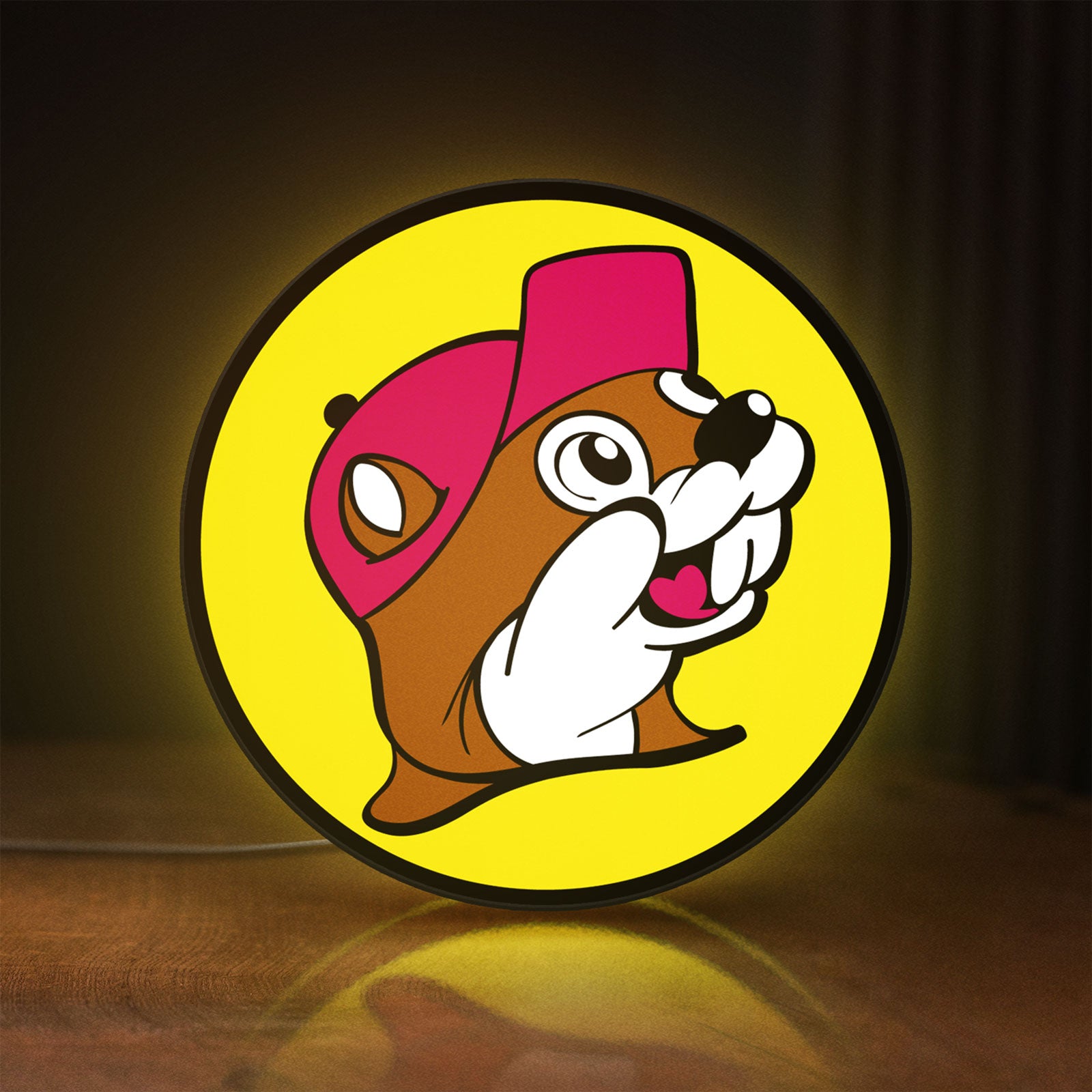 Front view of Buc-ee's Beaver Mascot LED lightbox sign glowing on a wooden desk