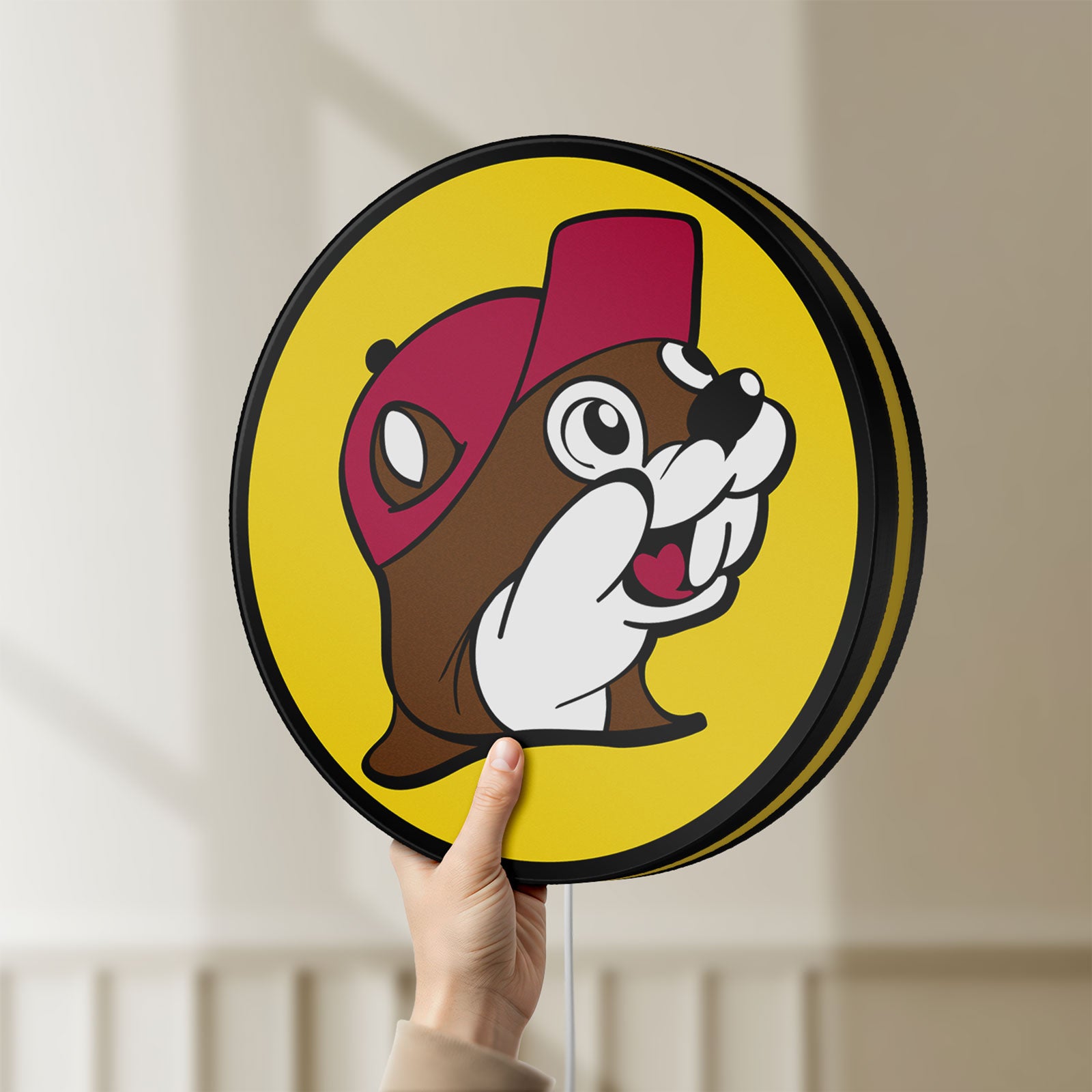 Unlit Buc-ee's Beaver Mascot LED lightbox held by hand to show size and details