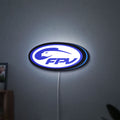 FPV Drone Pilot Gift LED lightbox hanging on a wall with blue glow