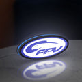 FPV Drone Pilot Gift LED lightbox standing on a desk from an angled side view with blue glow