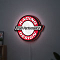 Drudi Performance LED lightbox hanging on a wall with red glow