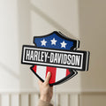 Unlit Harley Shield Motorcycle LED lightbox held by hand to show size and details