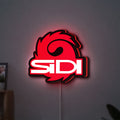 Sidi Cycling LED lightbox hanging on a wall with red glow
