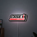 Case IH Agriculture LED lightbox hanging on a wall with white glow