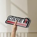Unlit Case IH Agriculture LED lightbox held by hand to show size and details