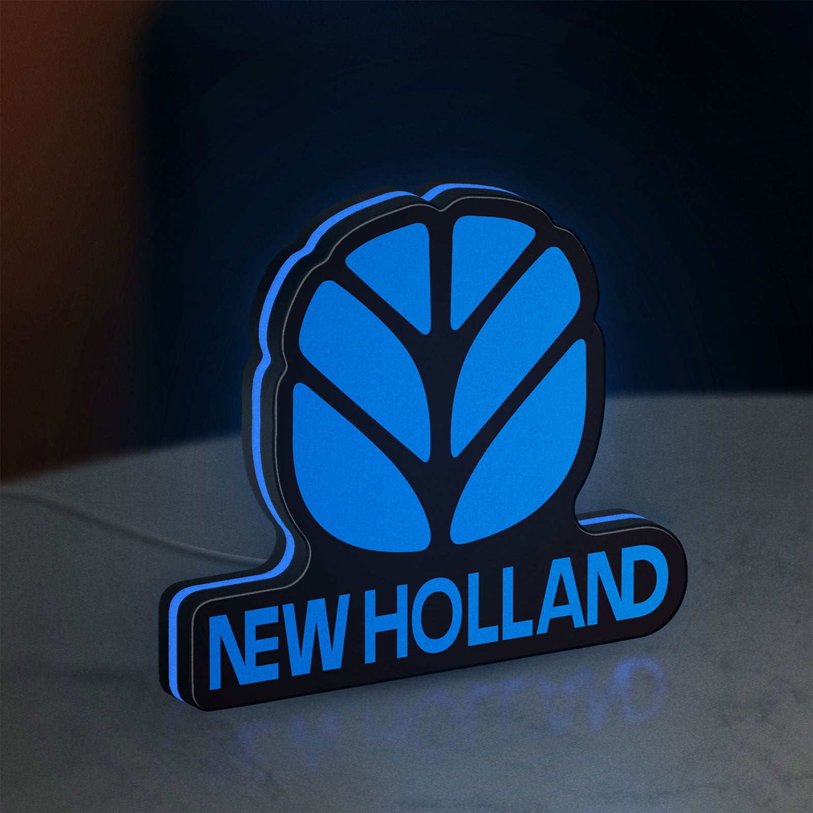 New Holland LED lightbox standing on a desk from an angled side view with blue glow
