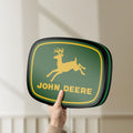 Unlit John Deere LED lightbox held by hand to show size and details