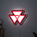 Massey Ferguson LED lightbox hanging on a wall with white glow