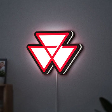 Massey Ferguson LED lightbox hanging on a wall with white glow