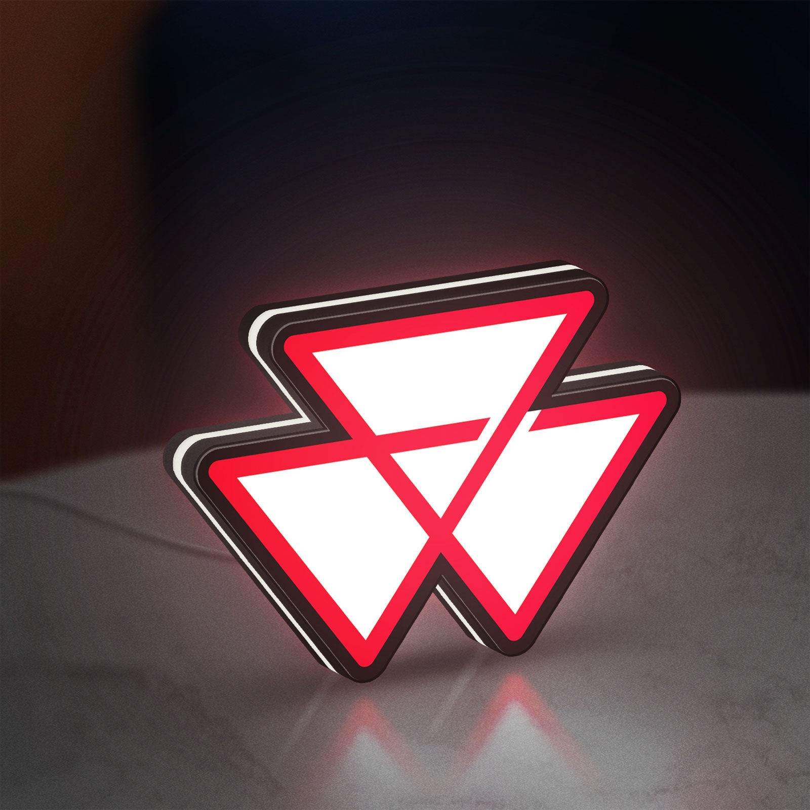 Massey Ferguson LED lightbox standing on a desk from an angled side view with white glow