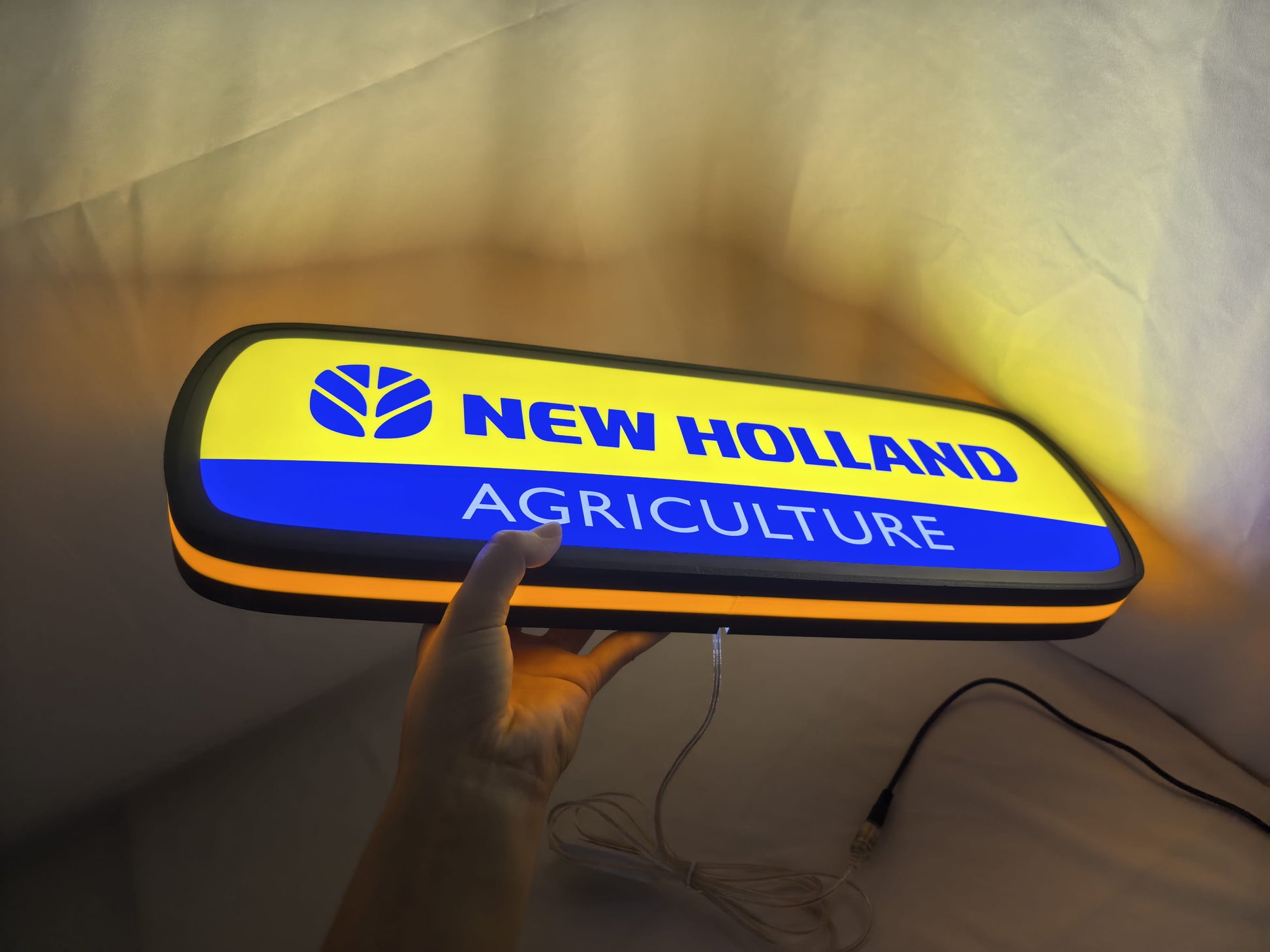 50cm New Holland Agriculture Glowing Wall Art - Illuminated handheld size reference, perfect for garage and man cave decor