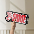 Unlit SAME LED lightbox held by hand to show size and details