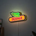 Dekalb LED lightbox hanging on a wall with yellow glow
