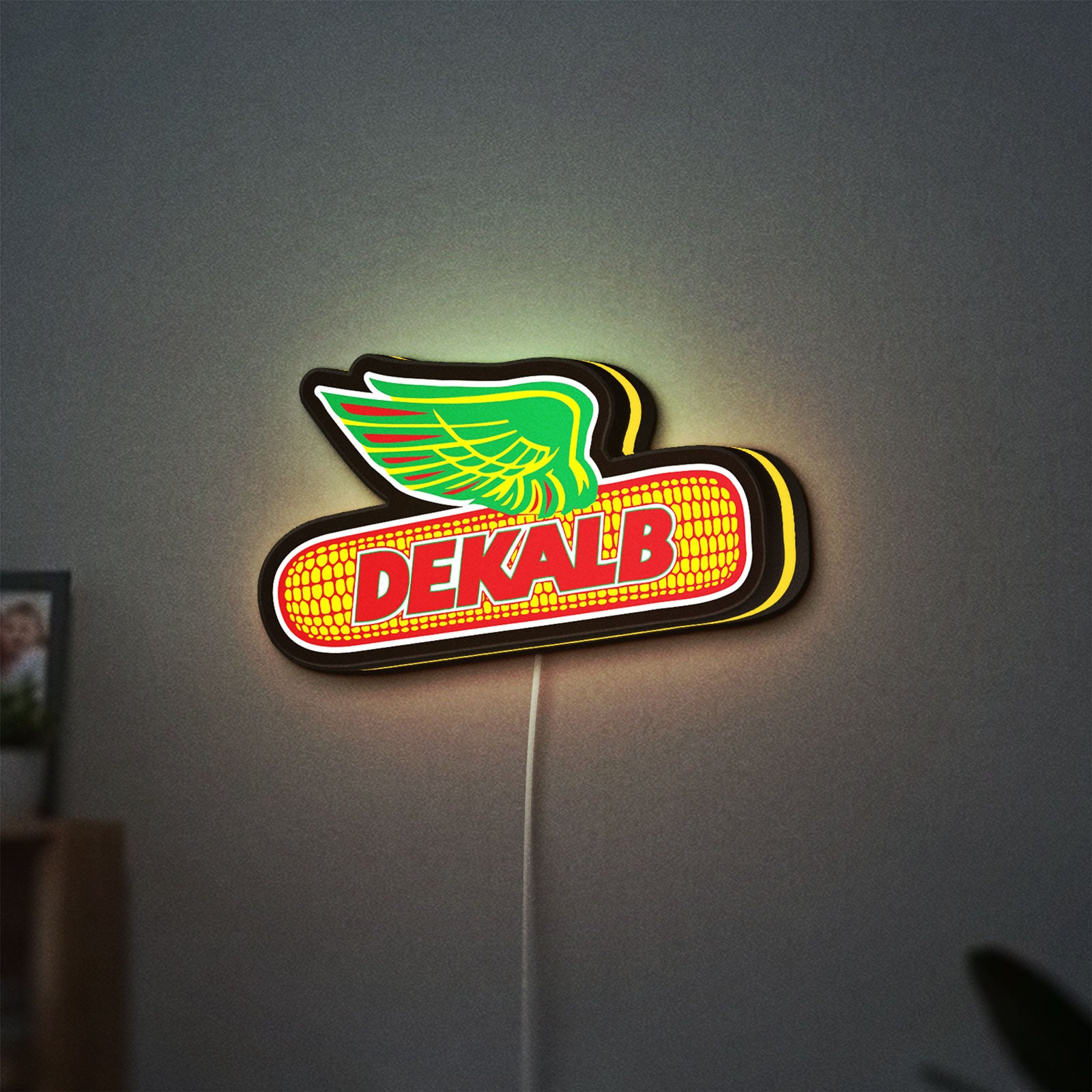 Dekalb LED lightbox hanging on a wall with yellow glow