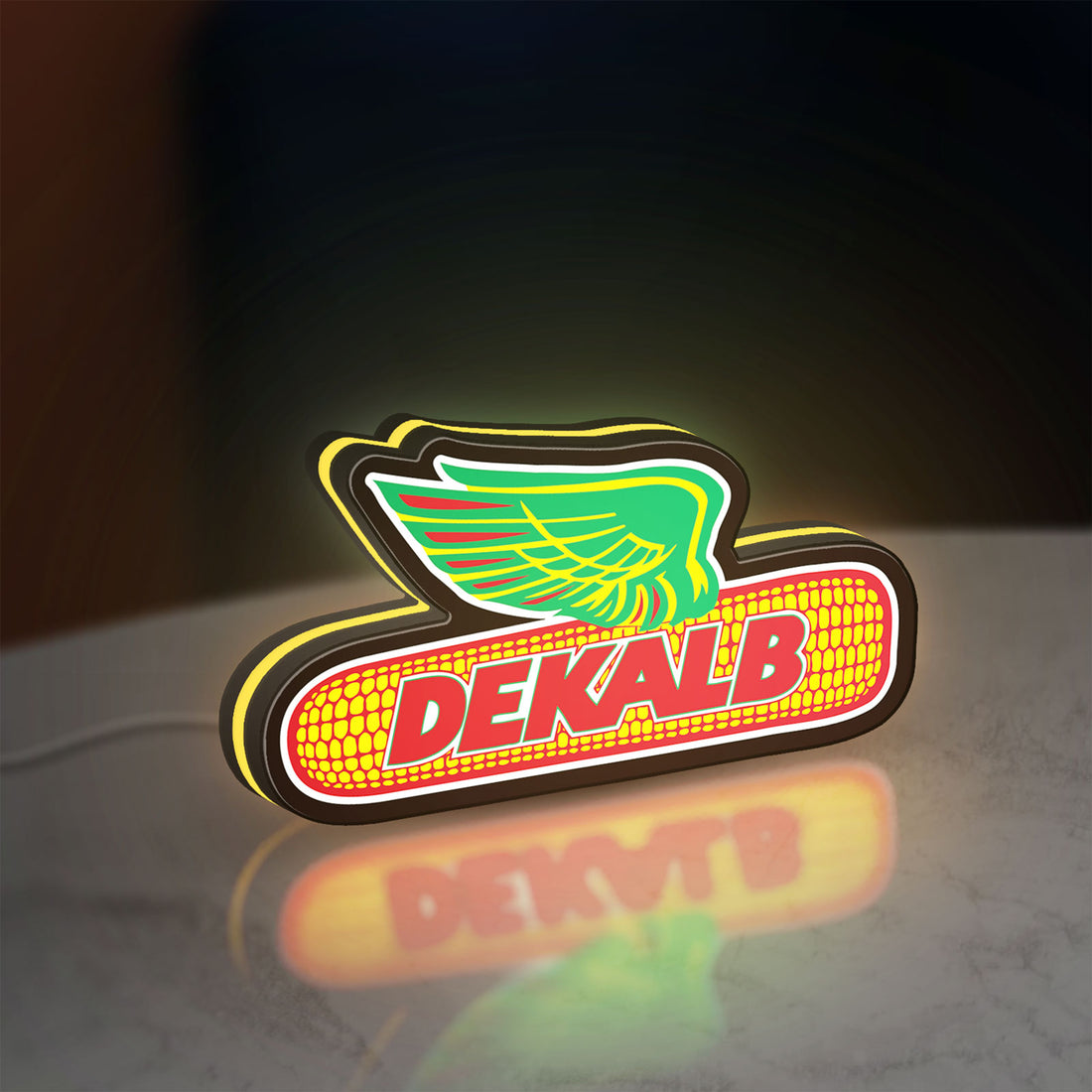 Dekalb LED lightbox hanging on a wall with yellow glow