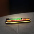 Dekalb LED lightbox lying flat on a desk with yellow glow