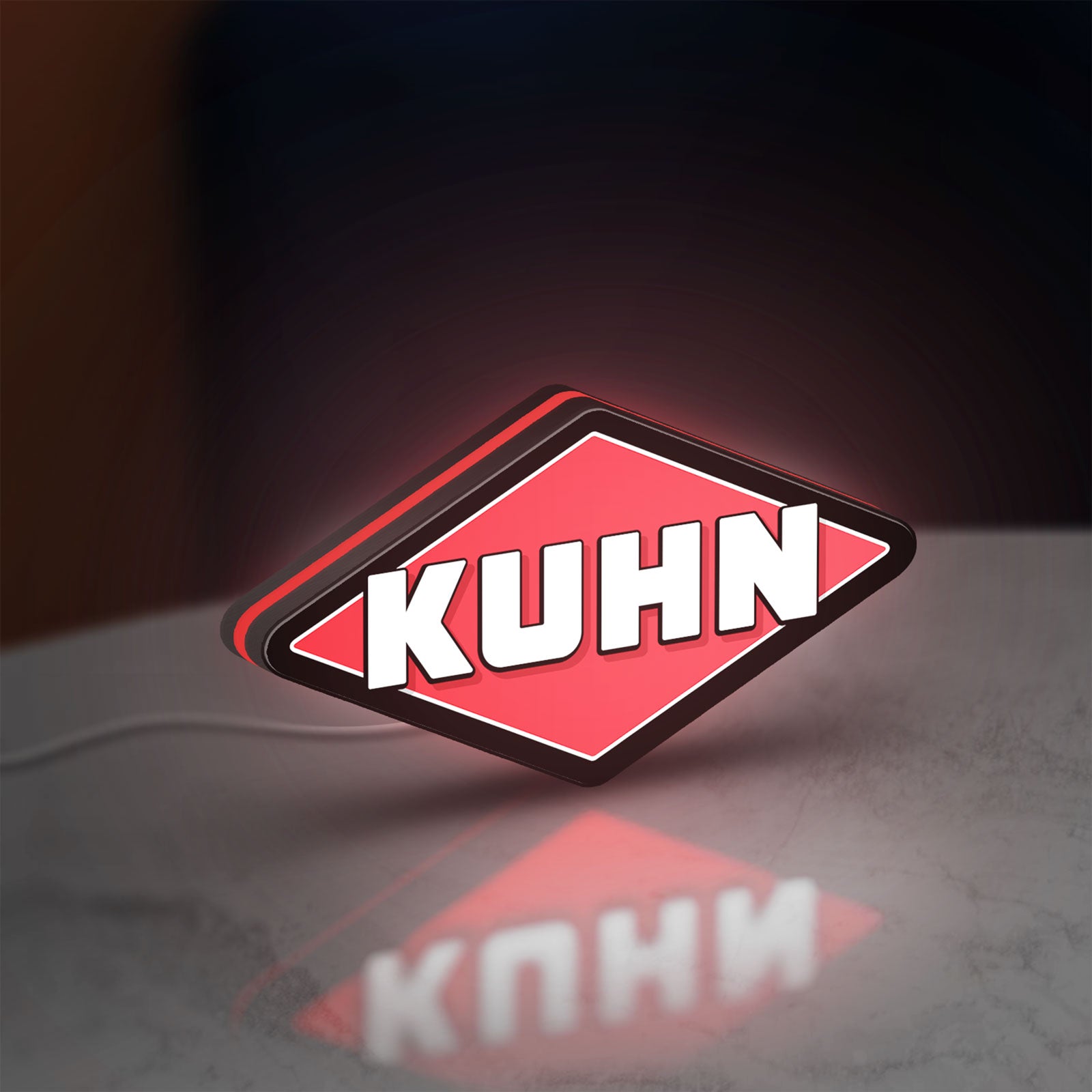 Kuhn LED lightbox standing on a desk from an angled side view with red glow